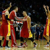 Jeremy Lin #7 (C) of the Houston Rockets celebrates a three point shot with his teammates during the game