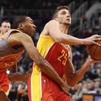 Houston Rockets forward Chandler Parsons, right, is fouled